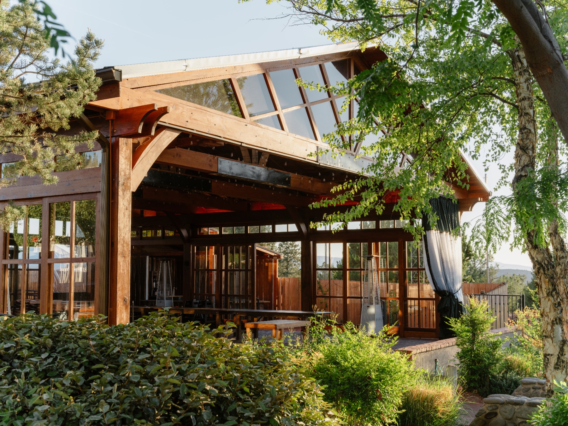 Exterior view of The Pavilion event space with timber beams and skylights